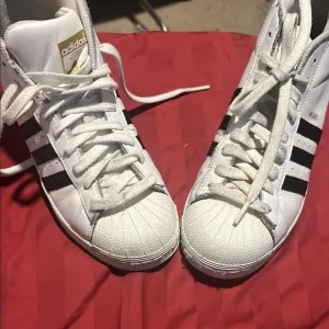 Adidas Classic White Sneakers with Black Stripes