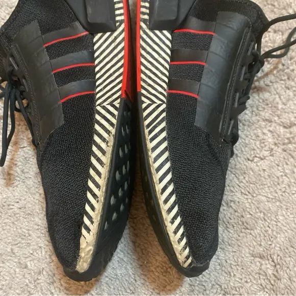 Adidas NMD R1 V2 dazzle Black and Red Sneakers with Futuristic Aesthetic