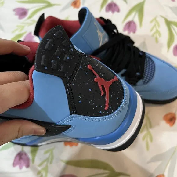 Air Jordan 4 blue and black sneakers