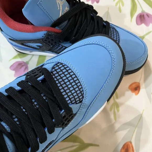 Air Jordan 4 blue and black sneakers