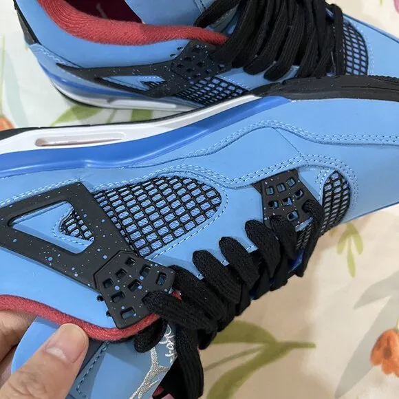 Air Jordan 4 blue and black sneakers