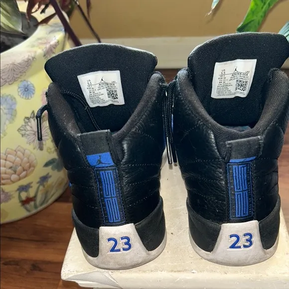 Air JORDAN Sneakers in Black and Blue Barley wore