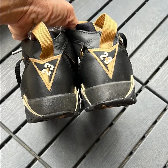 Black and Gold Air Jordan Sneakers