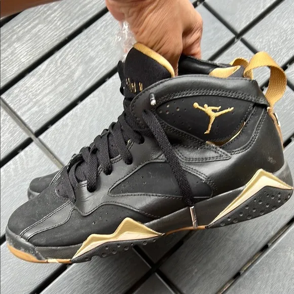Black and Gold Air Jordan Sneakers