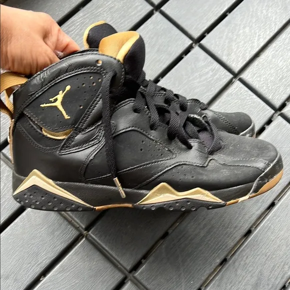 Black and Gold Air Jordan Sneakers