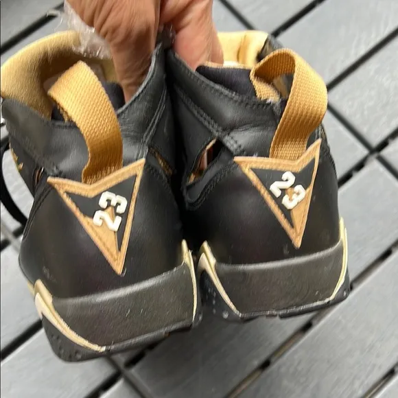 Black and Gold Air Jordan Sneakers