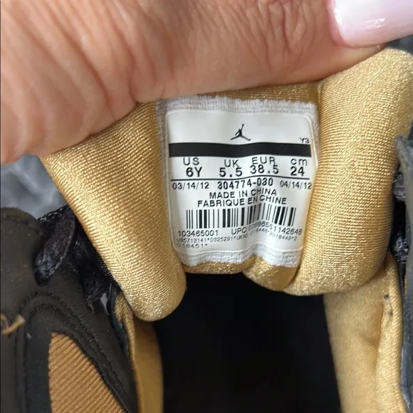 Black and Gold Air Jordan Sneakers