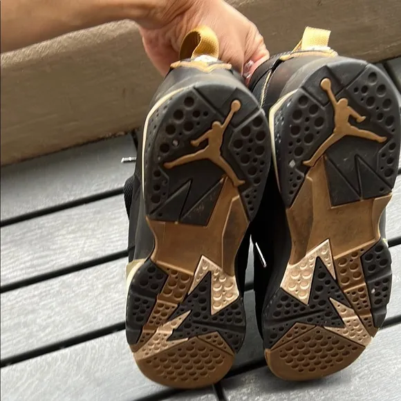 Black and Gold Air Jordan Sneakers