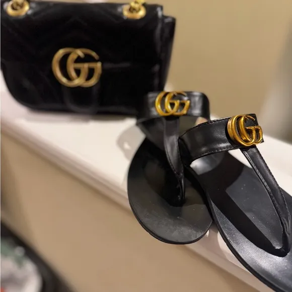 Black Thong Sandals with Gold Embellishments