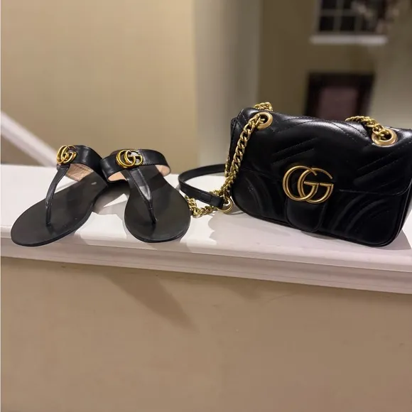 Black Thong Sandals with Gold Embellishments