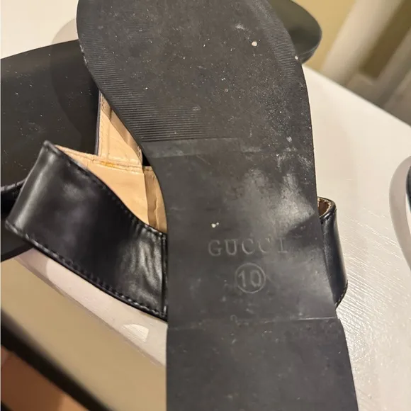 Black Thong Sandals with Gold Embellishments
