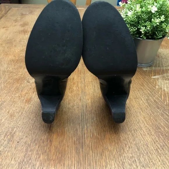 JCrew high heeled knee high leather boots