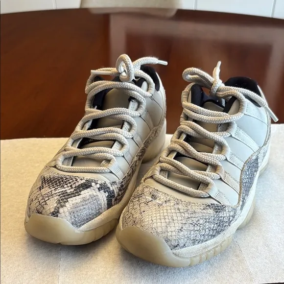 Jordan 100 snake print sneakers.