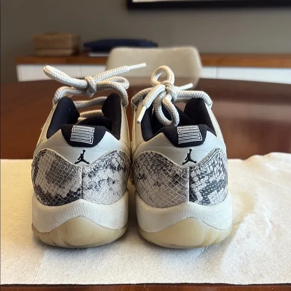 Jordan 100 snake print sneakers.