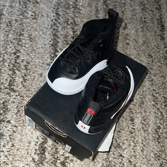 Jordan Black and White (Size 4C) great condition!