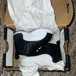 Jordan Black and White (Size 4C) great condition!