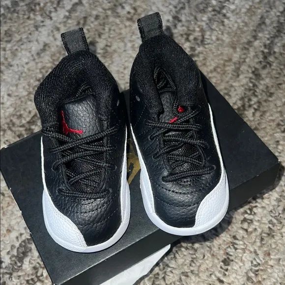 Jordan Black and White (Size 4C) great condition!