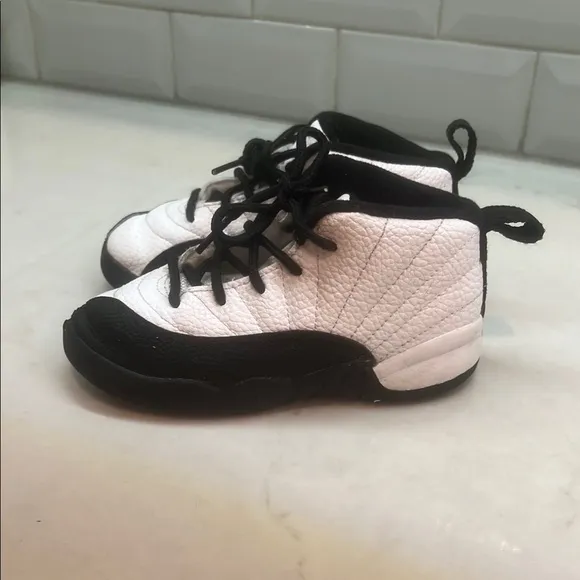 Kids Jordan's Black and White Sneakers