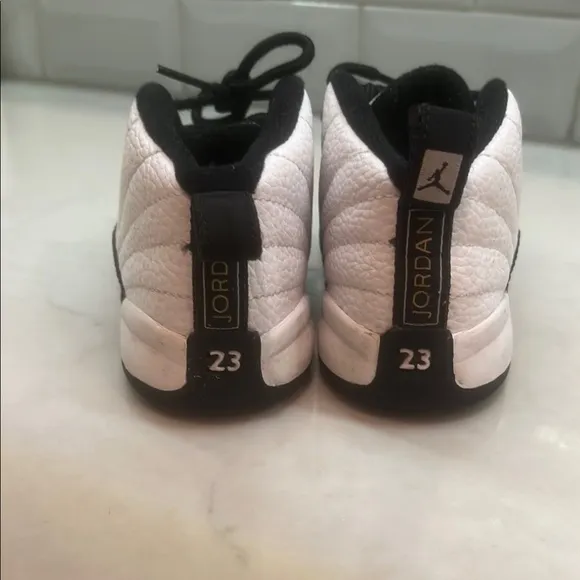 Kids Jordan's Black and White Sneakers