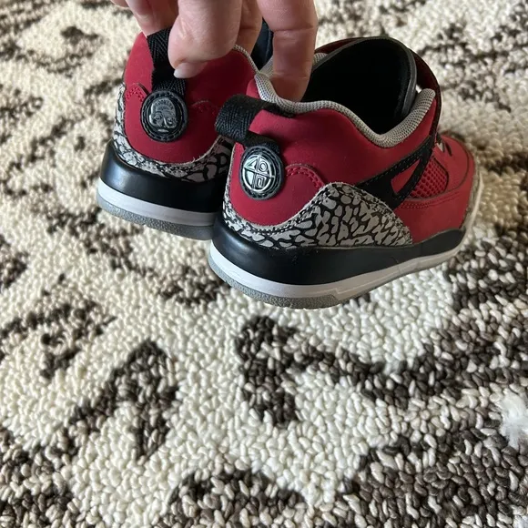 Kids Jordan’s Red and Black Sneakers