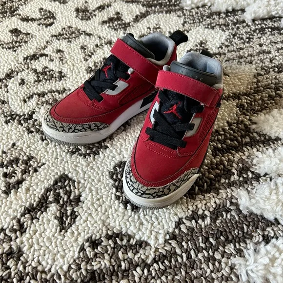 Kids Jordan’s Red and Black Sneakers