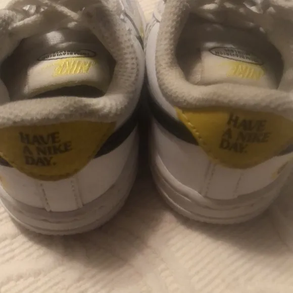 Kids White and Black Nike Sneakers