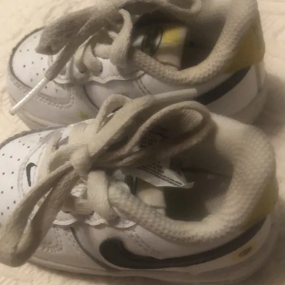 Kids White and Black Nike Sneakers