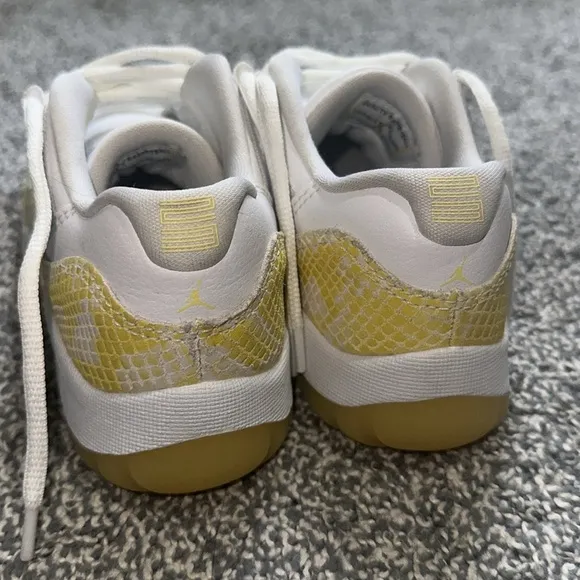Kids White and Yellow snakeskin Sneakers Jordan 11 size 13c.