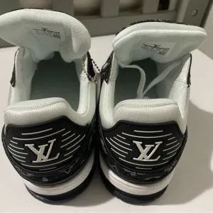 Louis Vuitton Black and White Sneakers with Iconic LV Branding