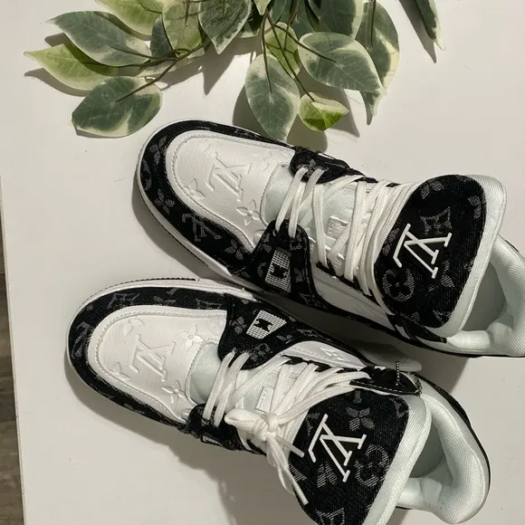 Louis Vuitton Black and White Sneakers with Iconic LV Branding