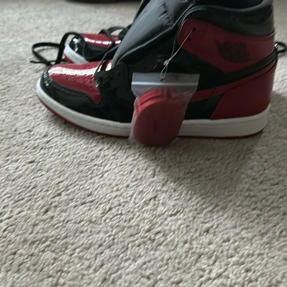 Men Air Jordon 1 Breds patent leather , size 10 , new.