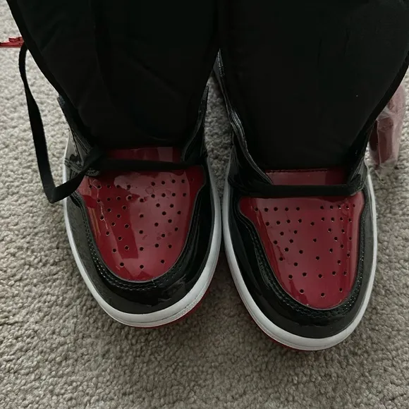 Men Air Jordon 1 Breds patent leather , size 10 , new.