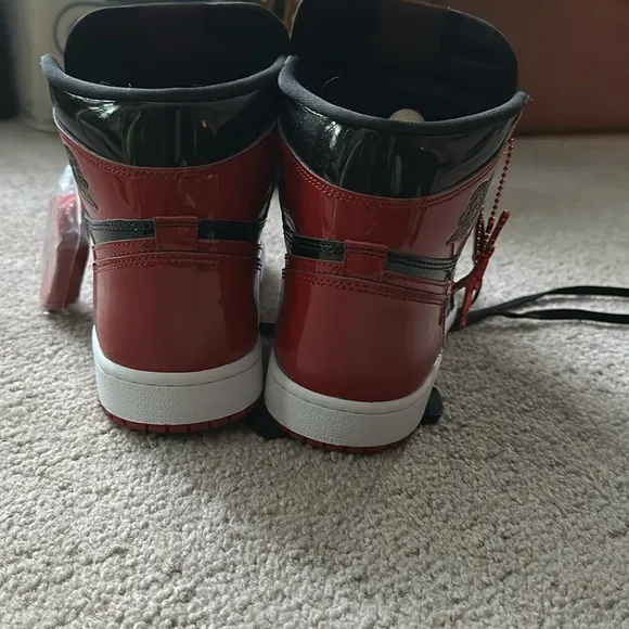Men Air Jordon 1 Breds patent leather , size 10 , new.