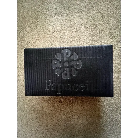 New in box. Papucei sandals.