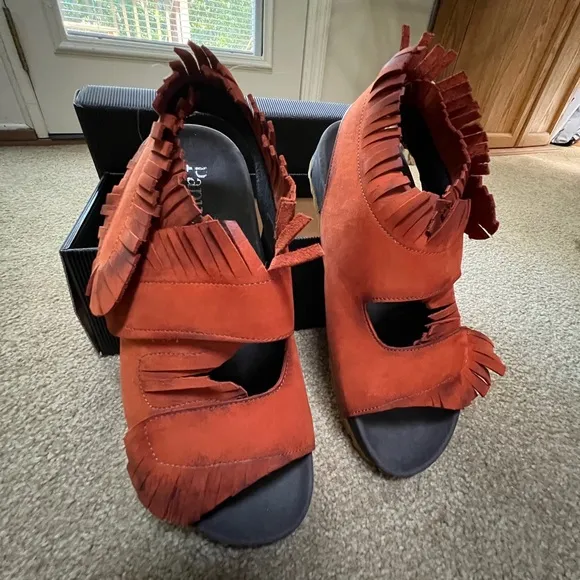 New in box. Papucei sandals.