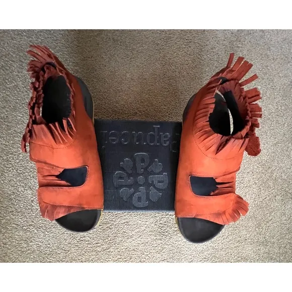 New in box. Papucei sandals.