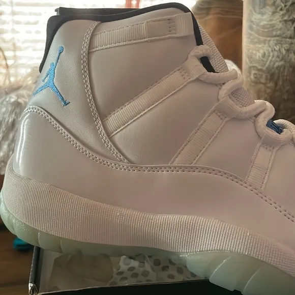 Nike Air Jordan Retro 11 White and Blue Sneakers