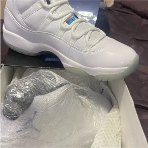 Nike Air Jordan Retro 11 White and Blue Sneakers
