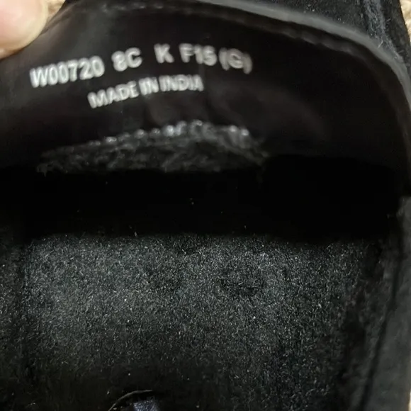 NWOB! Cole Haan SZ 8C black faux fur lined buckle front suede loafers.