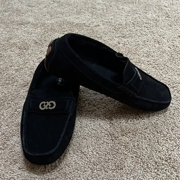 NWOB! Cole Haan SZ 8C black faux fur lined buckle front suede loafers.