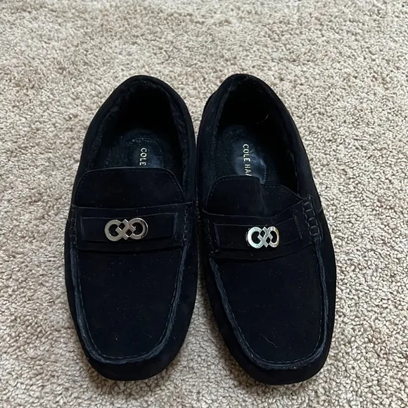 NWOB! Cole Haan SZ 8C black faux fur lined buckle front suede loafers.