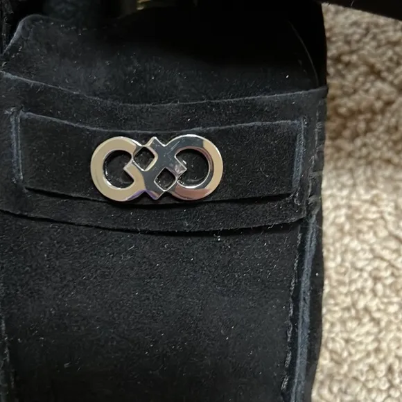 NWOB! Cole Haan SZ 8C black faux fur lined buckle front suede loafers.