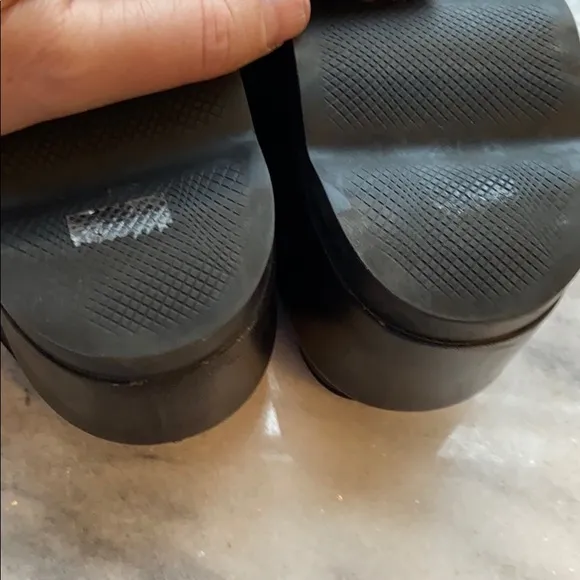 Prada cross cross sandals with wavy sole