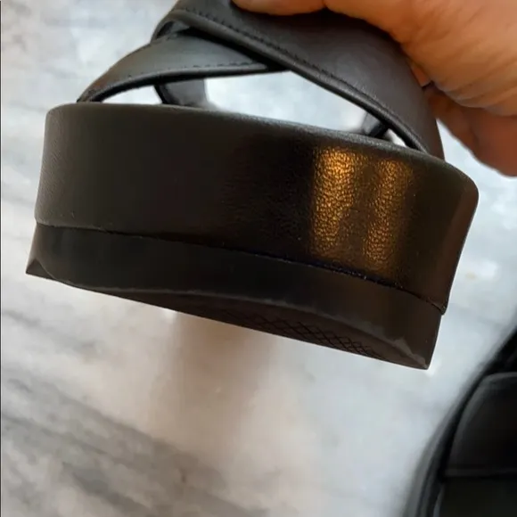 Prada cross cross sandals with wavy sole