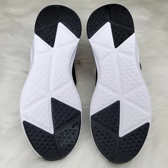 PUMA PROWL SLIP ON SNEAKERS BLACK AND WHITE