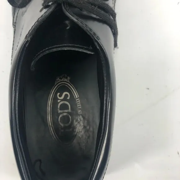 Tod’s black lace up loafers 9.5