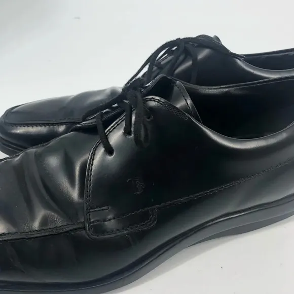 Tod’s black lace up loafers 9.5
