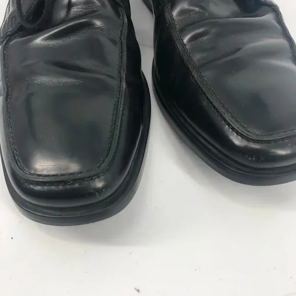 Tod’s black lace up loafers 9.5