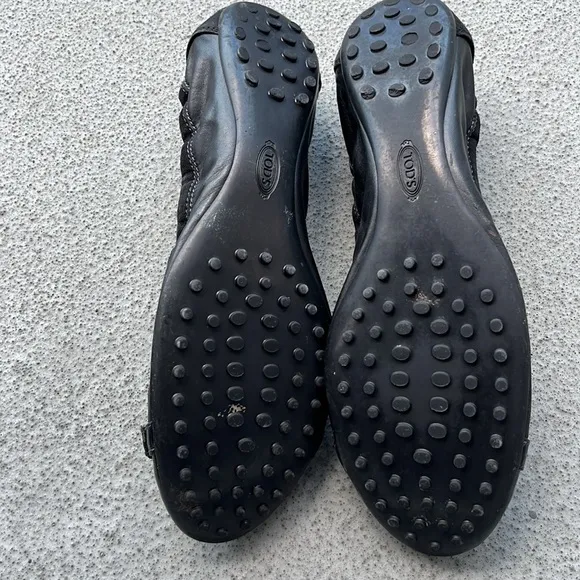 Tod’s “Dee” Black Patent Leather Buckle Ballet Flats