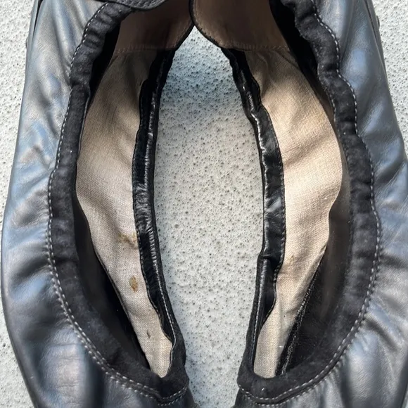 Tod’s “Dee” Black Patent Leather Buckle Ballet Flats